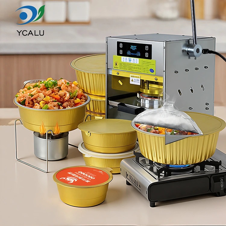 Machine de thermoscellage manuelle avec des récipients en papier d'aluminium doré Machine de thermoscellage manuelle avec des récipients en papier d'aluminium doré